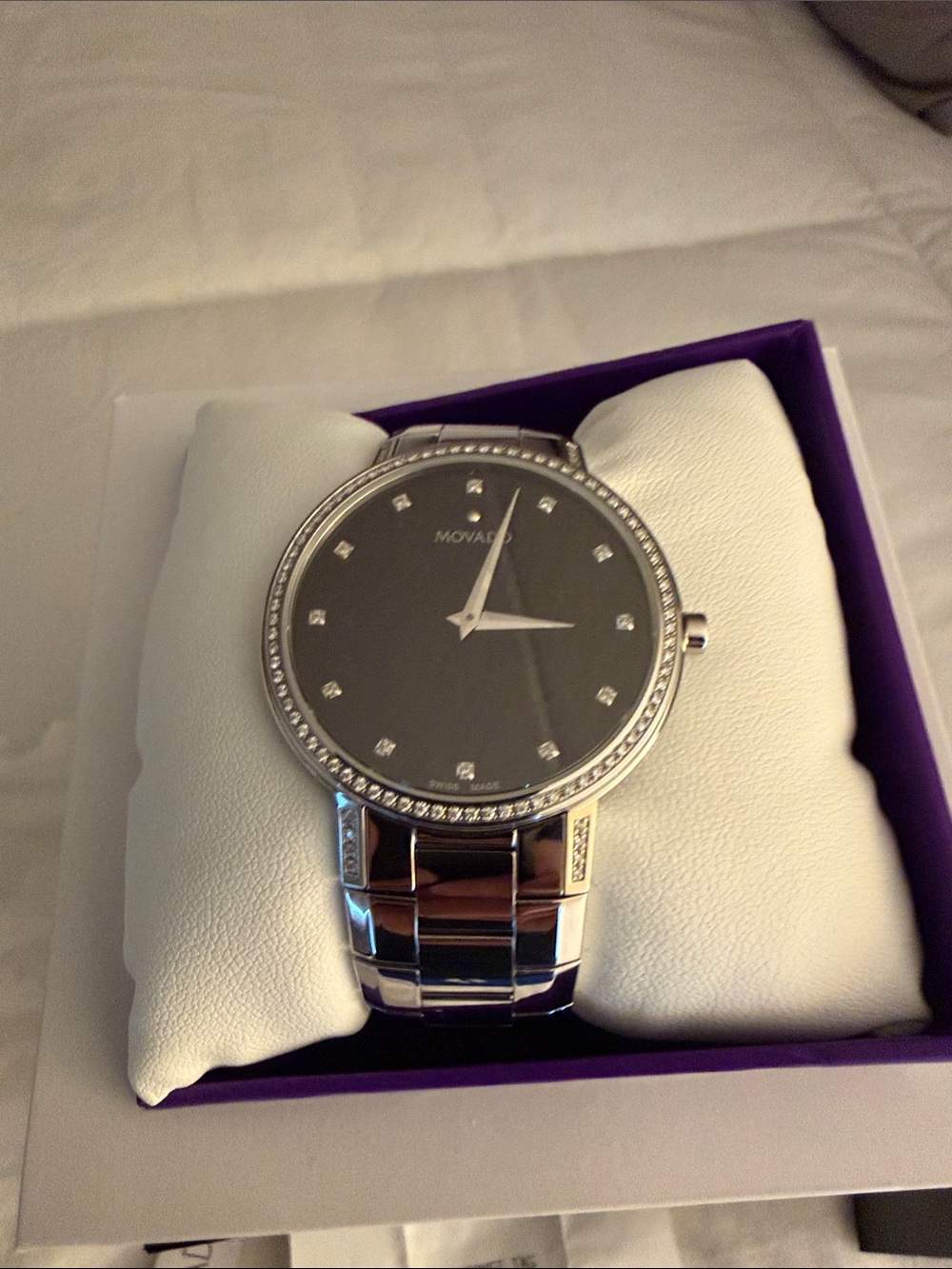Movado White Tag with Black Logo